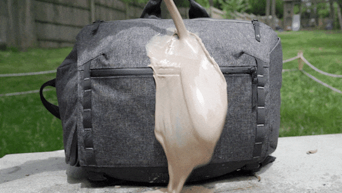 a loop of coffee being spilt on a Fathercraft diaper bag