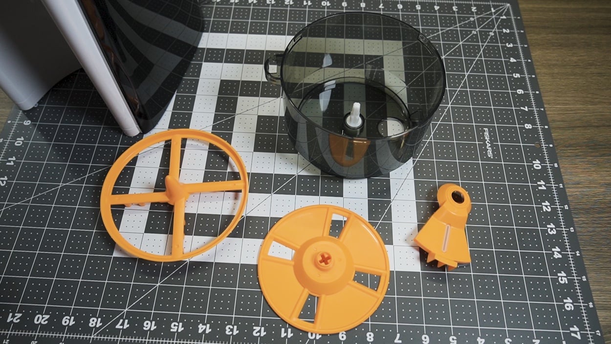 Formula mixing parts of the Baby Brezza Formula Pro Advanced on a table
