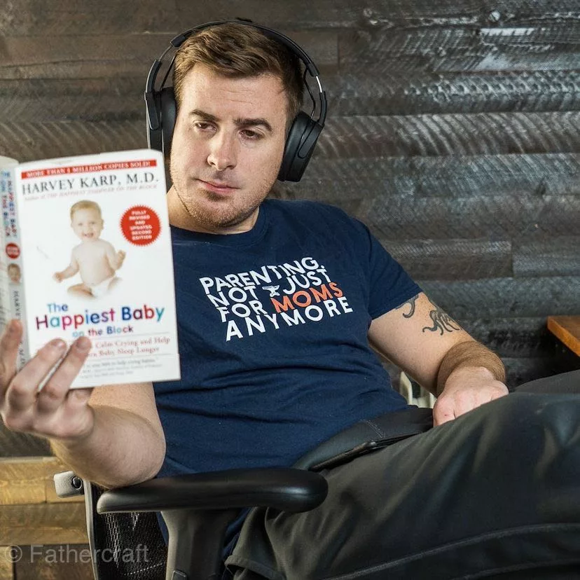 John from Fathercraft reading "The Happiest Baby on the Block".