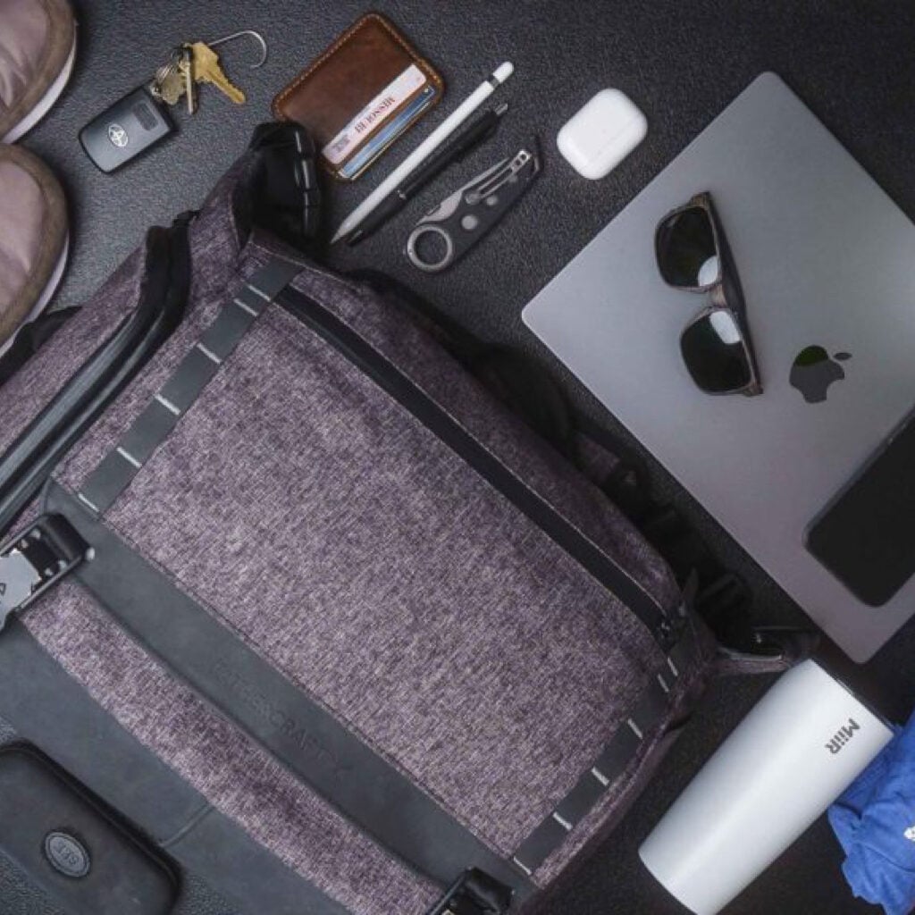 Our best diaper bag of 2024: the Fathercraft bag with its contents on a table