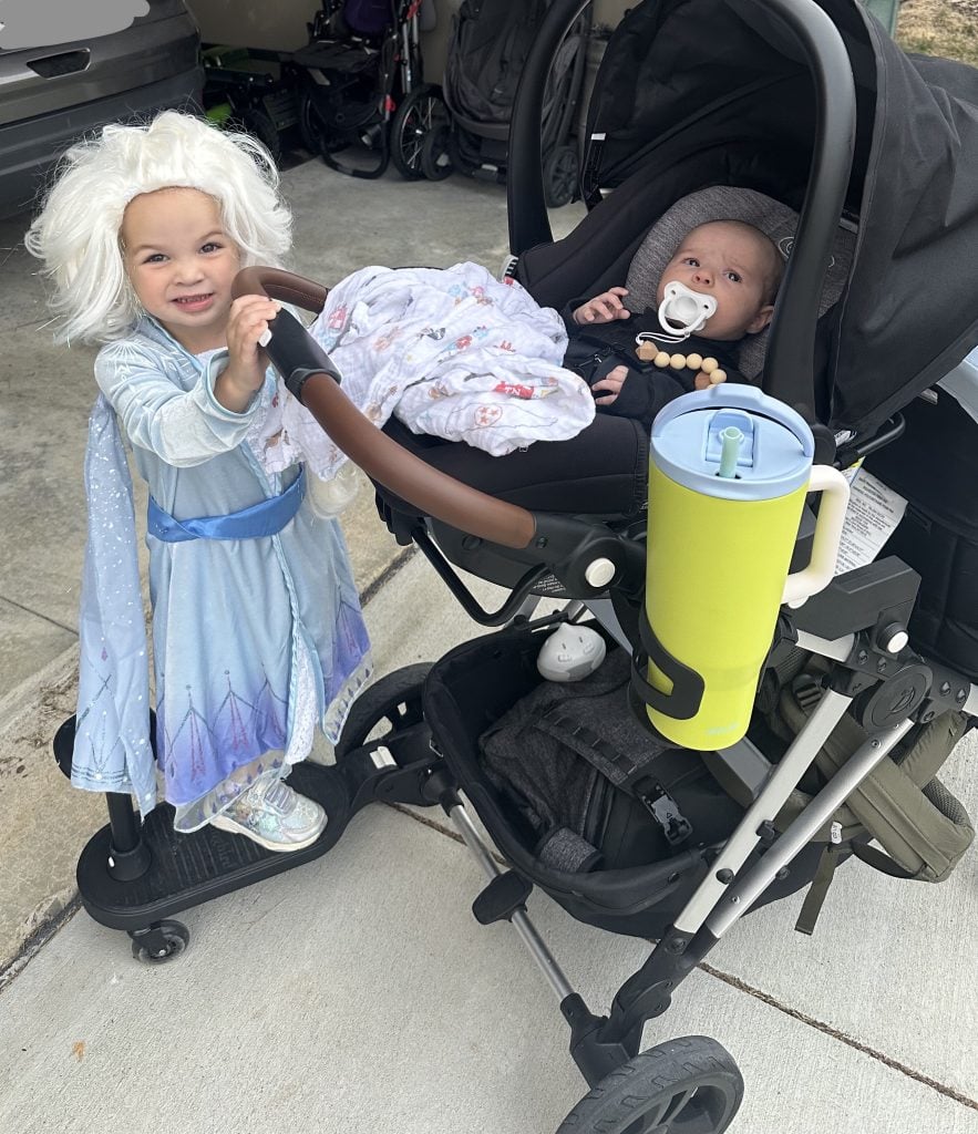 a baby and a preschooler ride on the Mockingbird