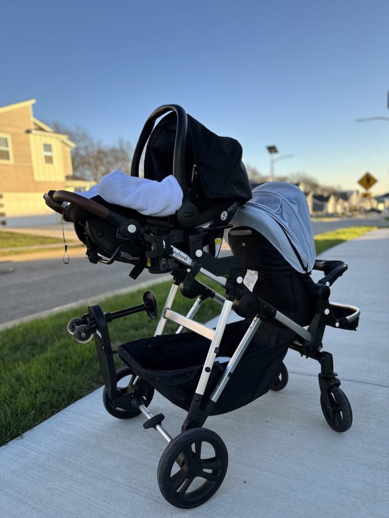 mockingbird stroller is parked on a sidewalk