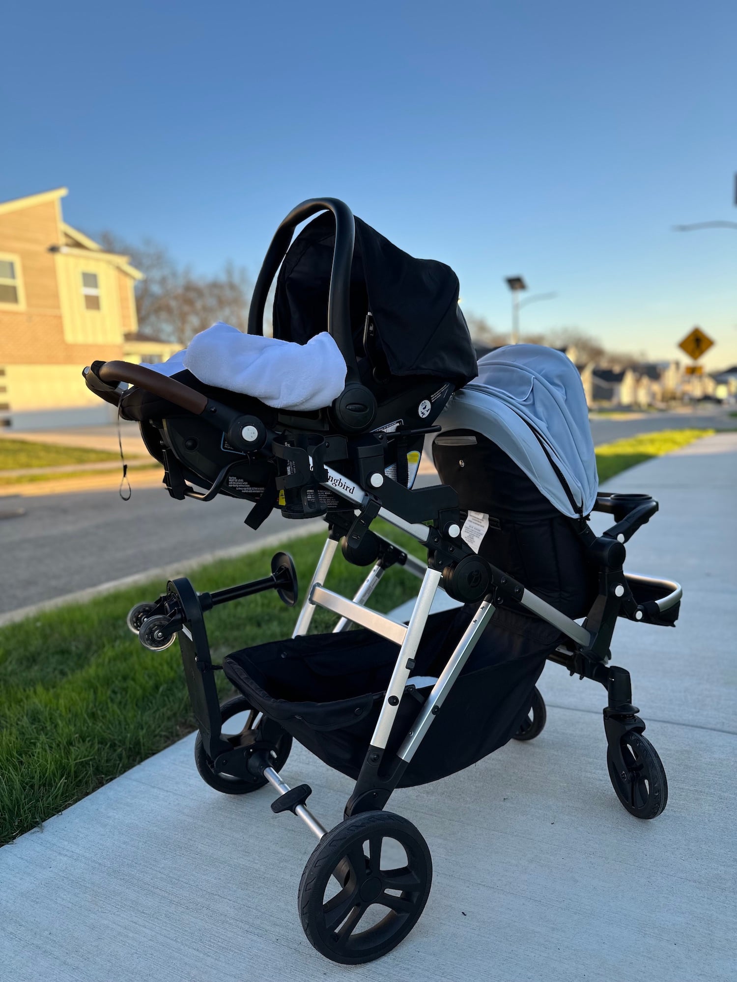 mockingbird stroller is parked on a sidewalk