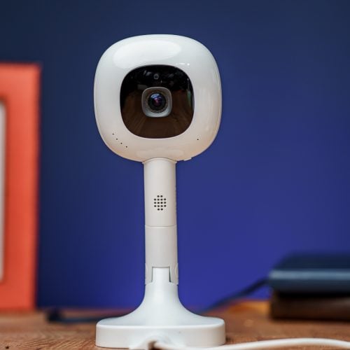 Nanit baby monitor on a table