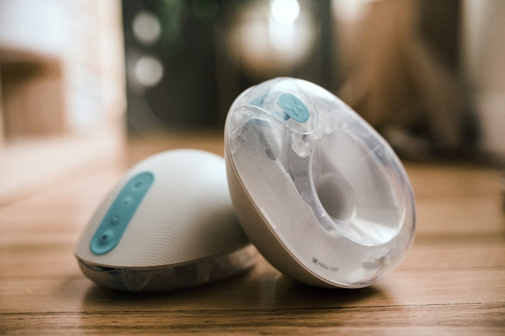 A Willow Pump breast pump on a table