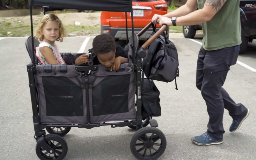 Two children in the best wagon stroller